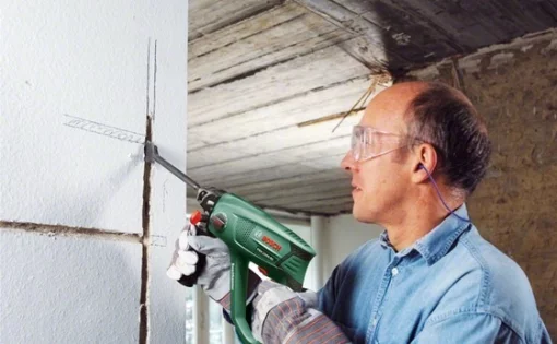 Перфоратор Bosch PBH 2500 RE SDS-plus 600Вт 1.9Дж 2.2кг