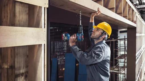 Набір із двох акумуляторних інструментів Bosch Professional 18В шліфмашина кутова GWS180-LI дриль-шурупокрут GSB 18V-50 зарядний пристрій акб 2х4А·год