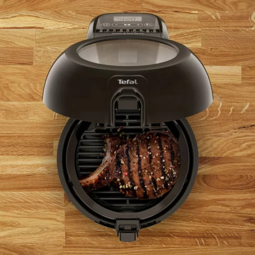Мультипіч Tefal ActiFry & Grill Genius, 1500Вт, чаша-4л, сенсорне керув., підкл. до смартфону, авто перемішування, пластик, чорно-золотий