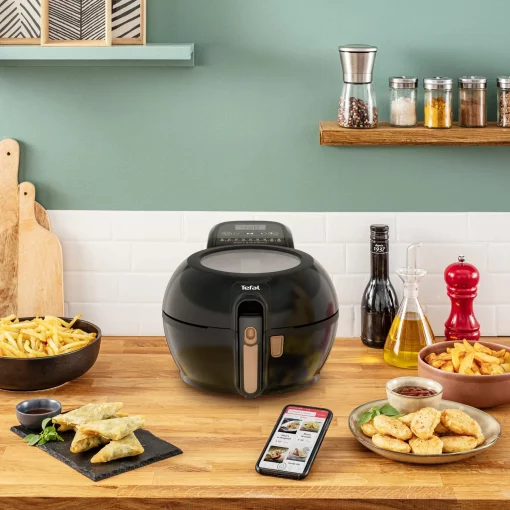 Мультипіч Tefal ActiFry & Grill Genius, 1500Вт, чаша-4л, сенсорне керув., підкл. до смартфону, авто перемішування, пластик, чорно-золотий