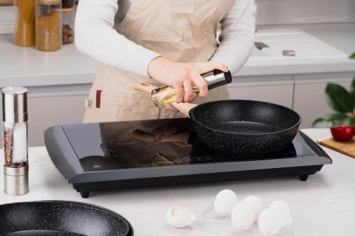 Плитка настільна Ardesto індукційна, конфорок - 2 на 1.3кВт + 1.6кВт горизонт., керування - сенсорне, таймер, чорний