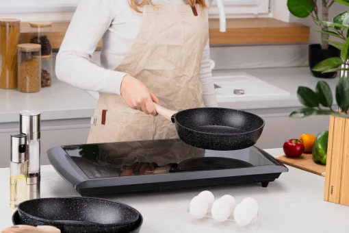 Плитка настільна Ardesto індукційна, конфорок - 2 на 1.3кВт + 1.6кВт горизонт., керування - сенсорне, таймер, чорний