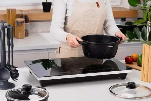 Плитка настільна Ardesto індукційна, конфорок - 2 на 1.3кВт + 1.8кВт горизонт., керування - сенсорне, таймер, boost, чорний