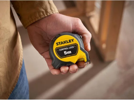 Рулетка вимірювальна CONTROL-LOCK довжиною 5 м, шириною 25 мм, в обгумованому корпусі, з подвійною шкалою STANLEY STHT37231-0