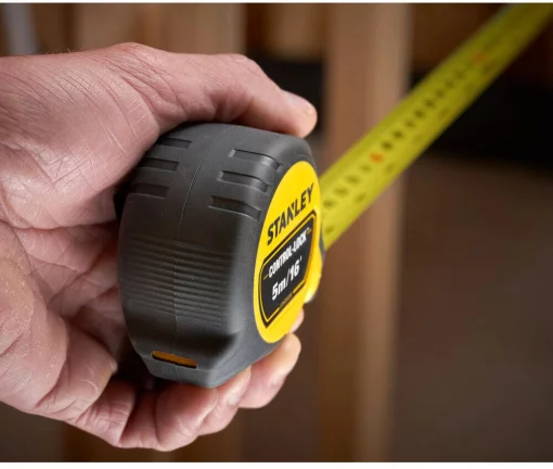 Рулетка вимірювальна CONTROL-LOCK довжиною 5 м/16, шириною 25 мм, в обгумованому корпусі, з подвійною шкалою STANLEY STHT37235-5