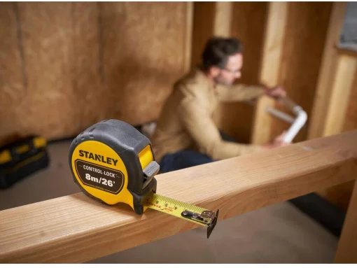 Рулетка вимірювальна CONTROL-LOCK довжиною 8 м/26, шириною 25 мм, в обгумованому корпусі, з подвійною шкалою STANLEY STHT37236-5