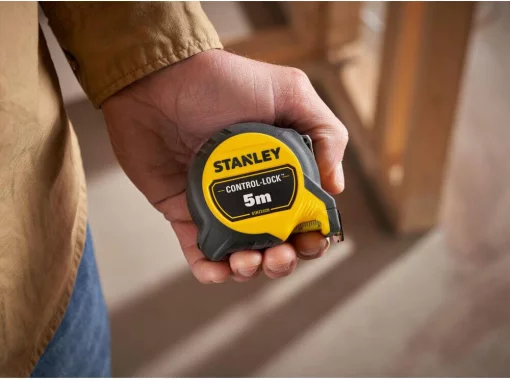 Рулетка вимірювальна CONTROL-LOCK довжиною 5 м, шириною 25 мм, в обгумованому корпусі, з подвійною шкалою STANLEY STHT37239-3